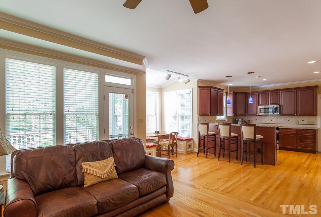 2408 Wertherson Lane Raleigh, NC 27613 - Photo 6 of 25 a living room with furniture kitchen view and a window