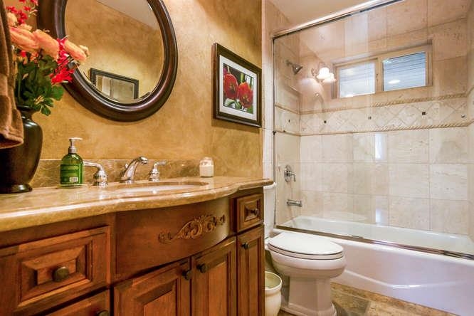 15541 Mussey Grade Road Ramona, CA 92065 - Photo 10 of 25 Beautiful cabinetry in hall bath.