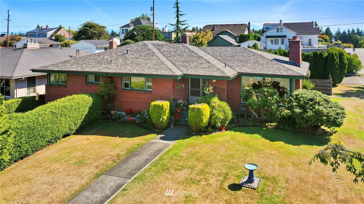 831 Rucker Avenue Everett, WA 98201 - Photo 1 of 40 a view of outdoor space yard and front view of a house