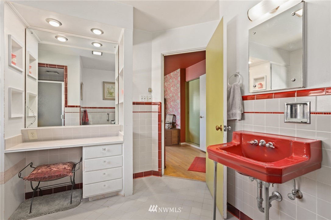 831 Rucker Avenue Everett, WA 98201 - Photo 17 of 40 a bathroom with a sink and a mirror