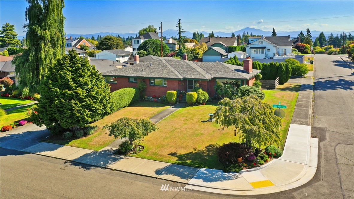 831 Rucker Avenue Everett, WA 98201 - Photo 3 of 40 a view of a swimming pool with a patio