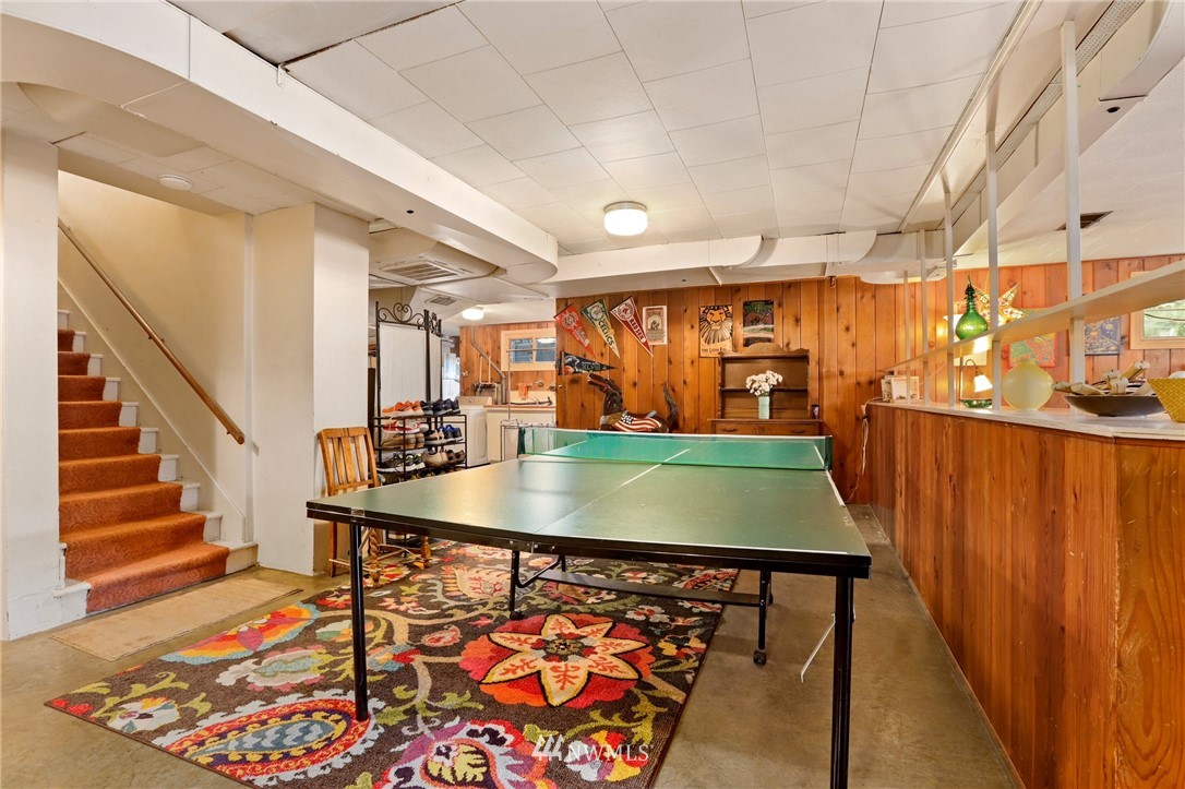 831 Rucker Avenue Everett, WA 98201 - Photo 23 of 40 a room with table tennis pool table and windows