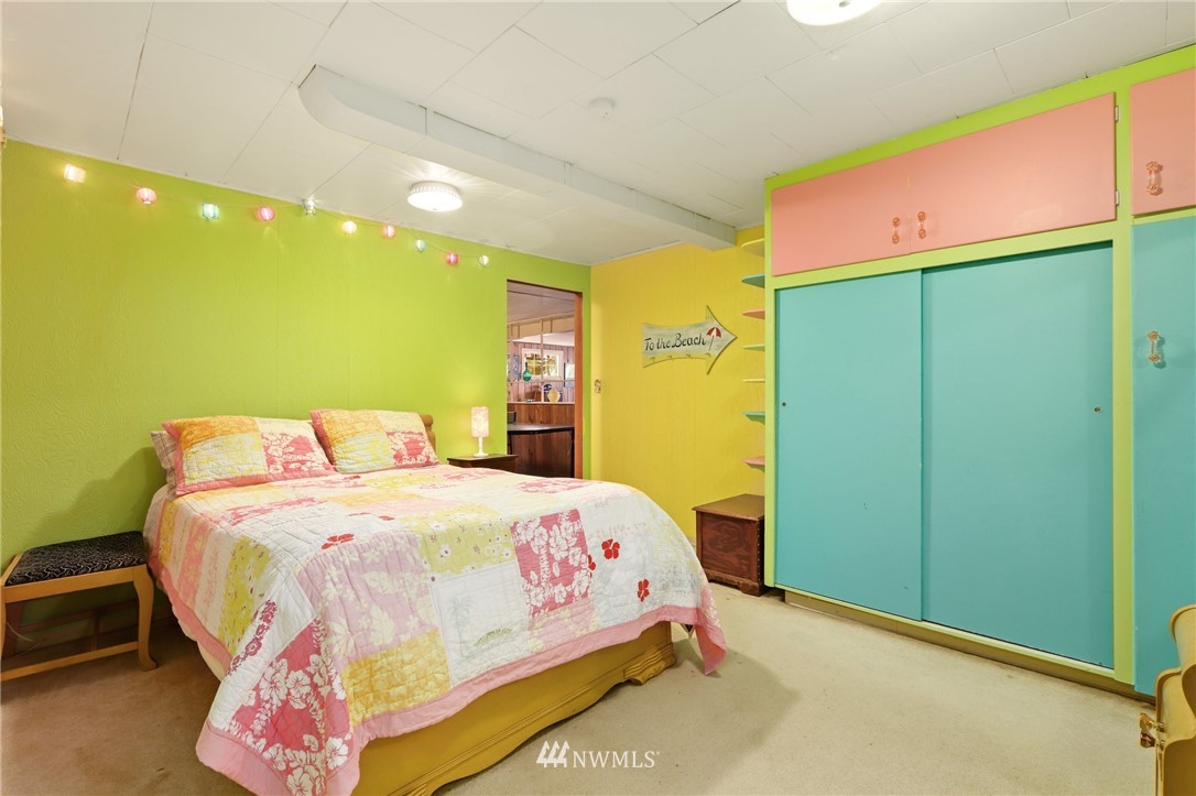 831 Rucker Avenue Everett, WA 98201 - Photo 29 of 40 a bedroom with a bed and a closet