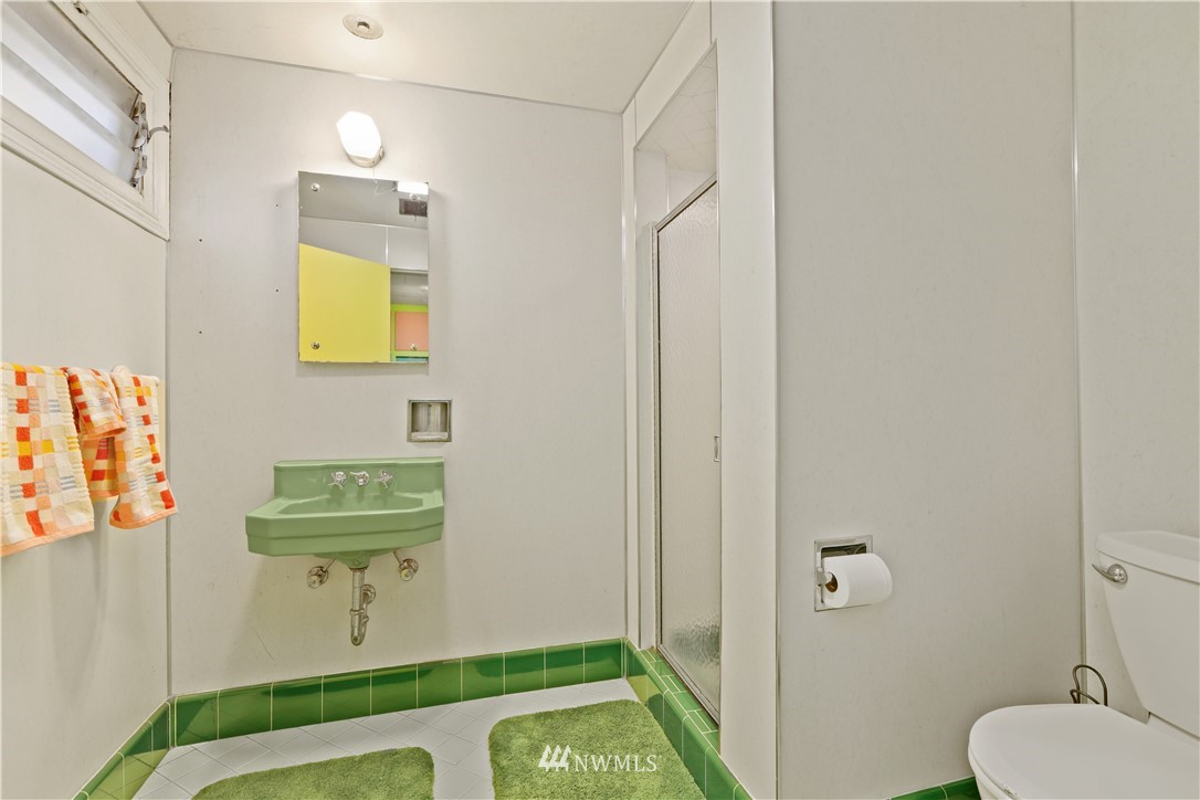 831 Rucker Avenue Everett, WA 98201 - Photo 31 of 40 a bathroom with a toilet and a sink