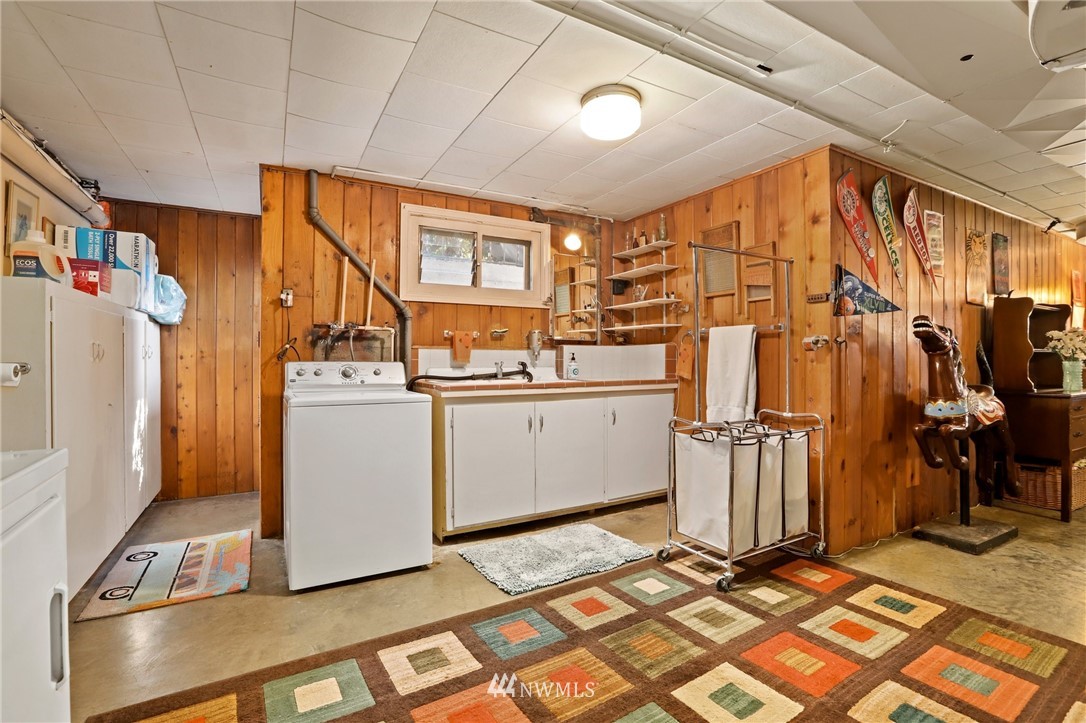 831 Rucker Avenue Everett, WA 98201 - Photo 32 of 40 a view of utility room with washer and dryer