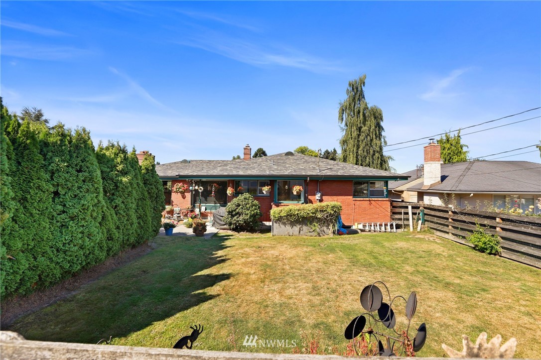 831 Rucker Avenue Everett, WA 98201 - Photo 35 of 40 a view of a house with garden