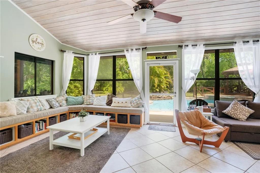 120 East Bahama Road Winter Springs, FL 32708 - Photo 21 of 37 a living room with furniture and a large window