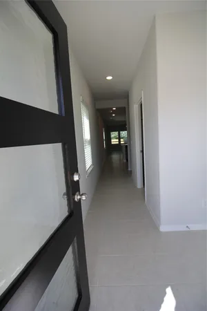 a kitchen with stainless steel appliances kitchen island granite countertop a sink and a stove