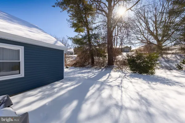 a view of a backyard of the house