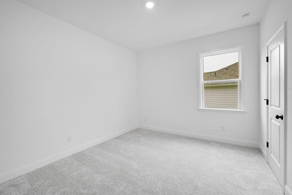 2311 Ellie Way Kennesaw, GA 30152 - Photo 18 of 35 an empty room with a window
