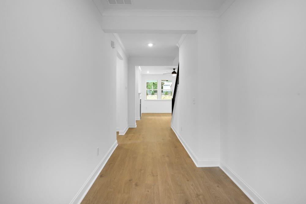 2311 Ellie Way Kennesaw, GA 30152 - Photo 2 of 35 a view of a hallway with wooden floor