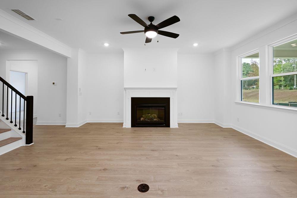 2311 Ellie Way Kennesaw, GA 30152 - Photo 7 of 35 a view of an empty room with a fireplace