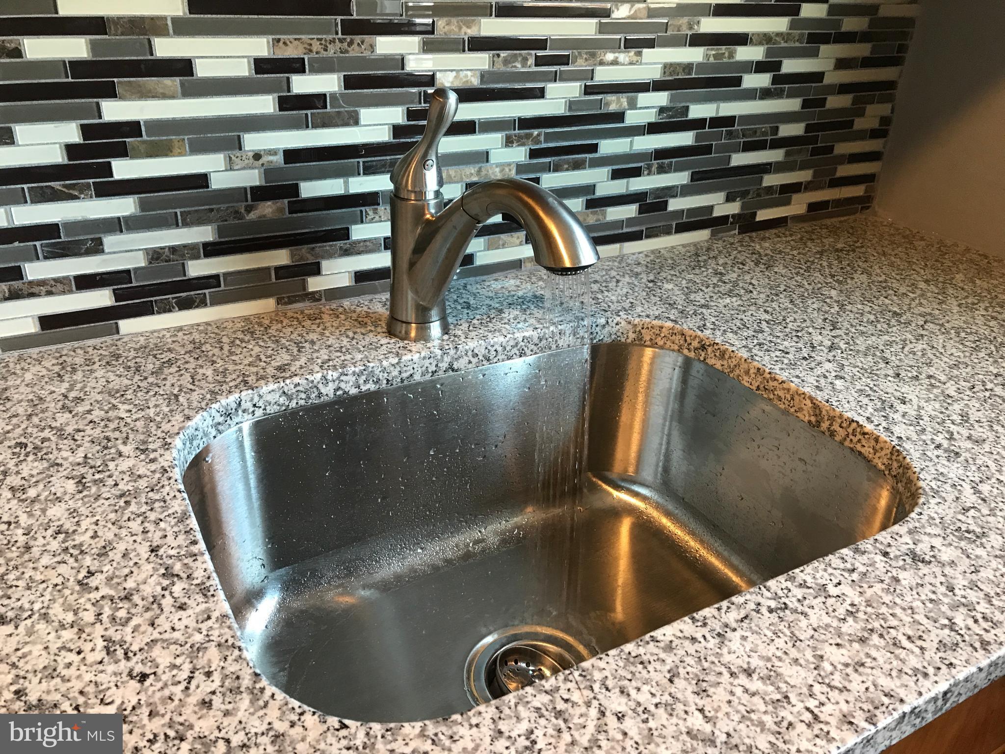 9618 Conmar Road Baltimore, MD 21220 - Photo 14 of 30 New granite counters, new kit sink & faucet