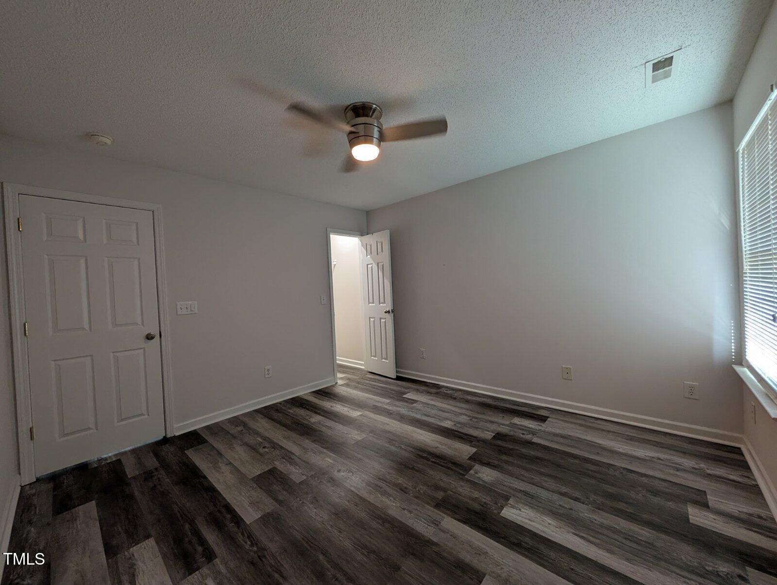 7528 Argent Valley Drive Raleigh, NC 27616 - Photo 29 of 47 wooden floor in an empty room