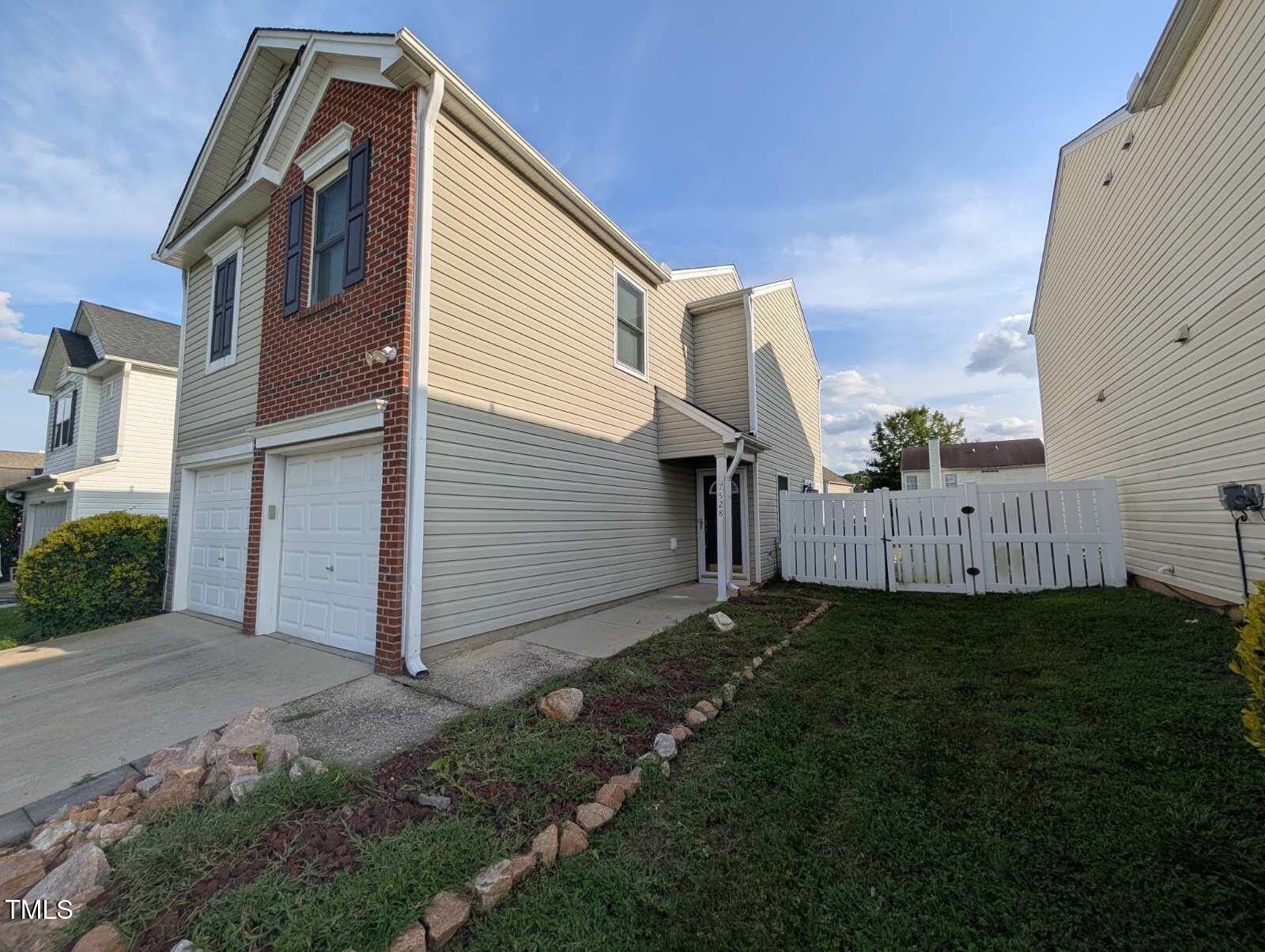 7528 Argent Valley Drive Raleigh, NC 27616 - Photo 3 of 47 a backyard of a house with lots of green space