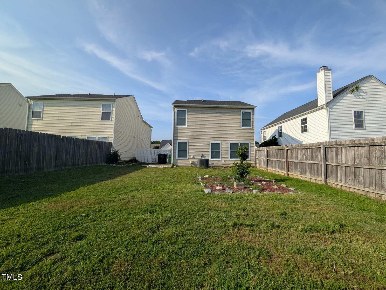 7528 Argent Valley Drive Raleigh, NC 27616 - Photo 43 of 47 a view of backyard with wooden fence