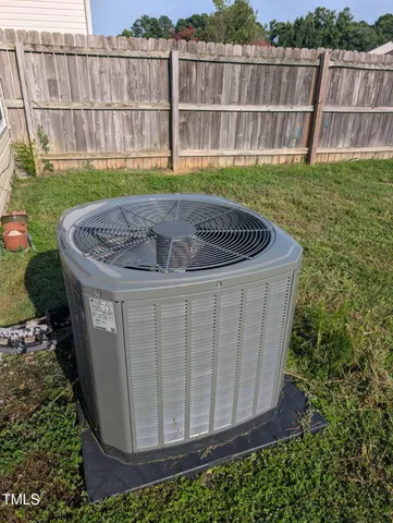 a view of a backyard with a swing