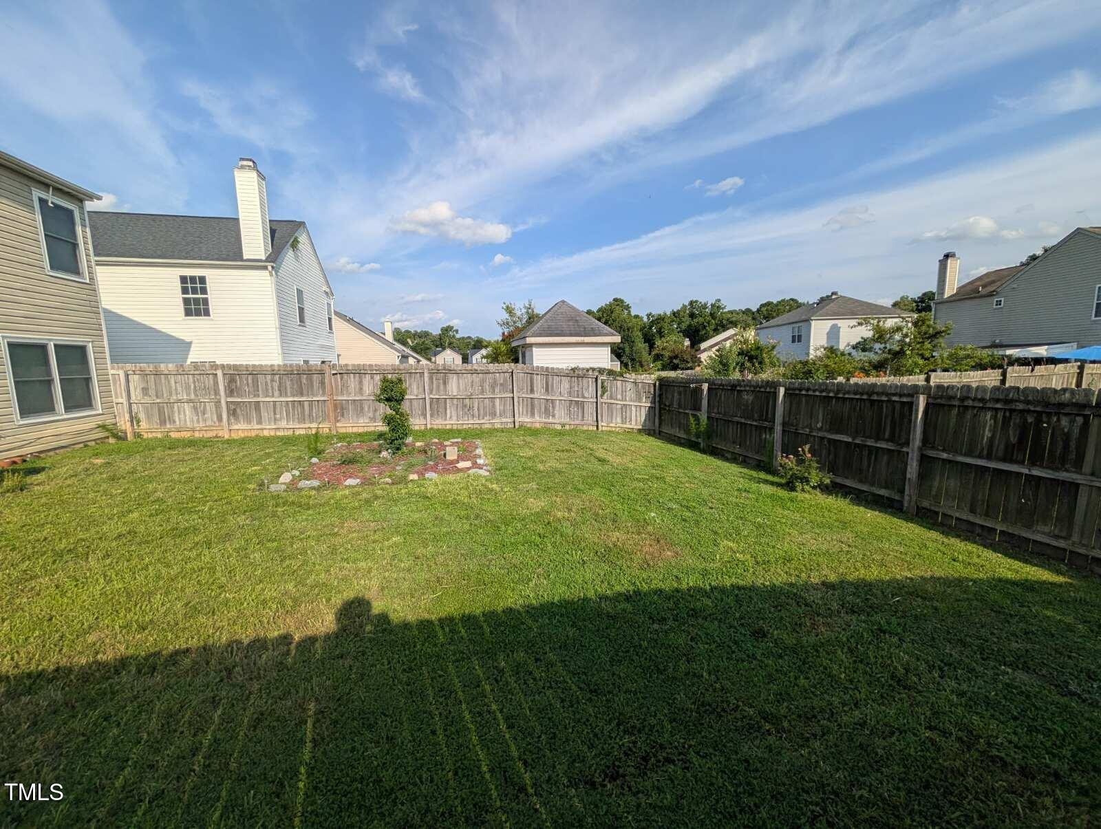 7528 Argent Valley Drive Raleigh, NC 27616 - Photo 8 of 47 a view of a garden