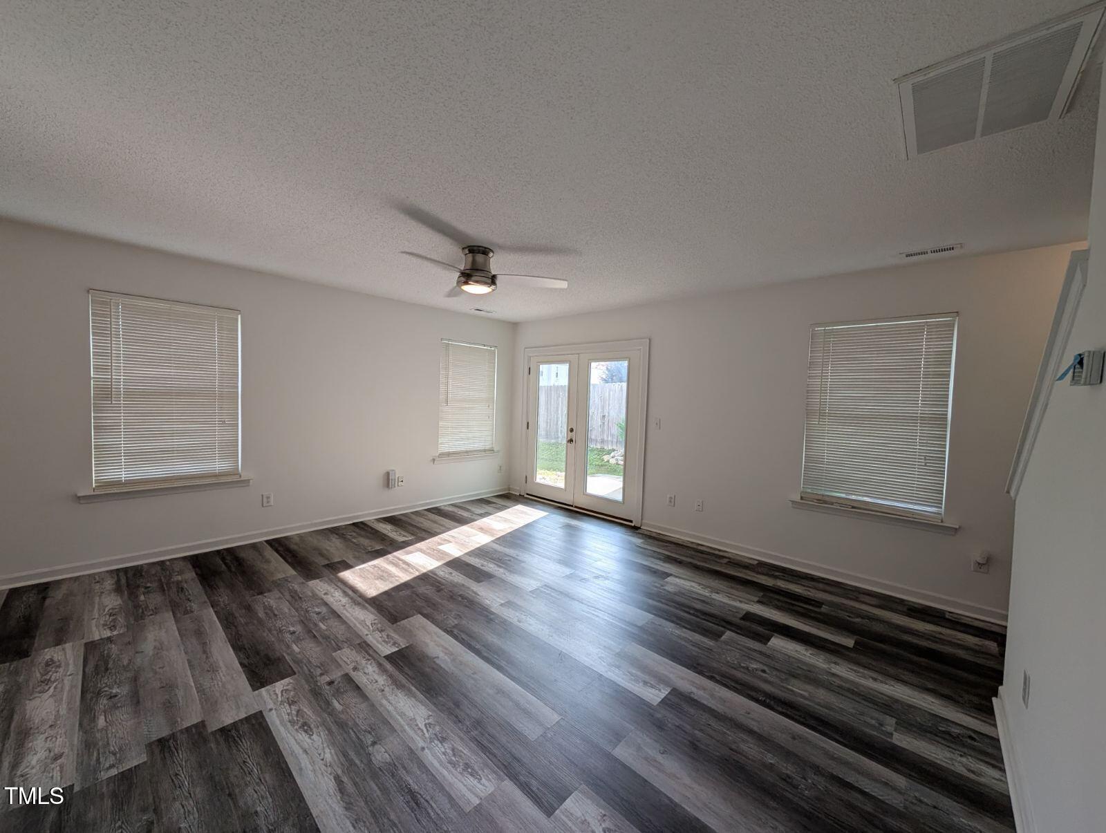 7528 Argent Valley Drive Raleigh, NC 27616 - Photo 9 of 47 a view of an empty room and window