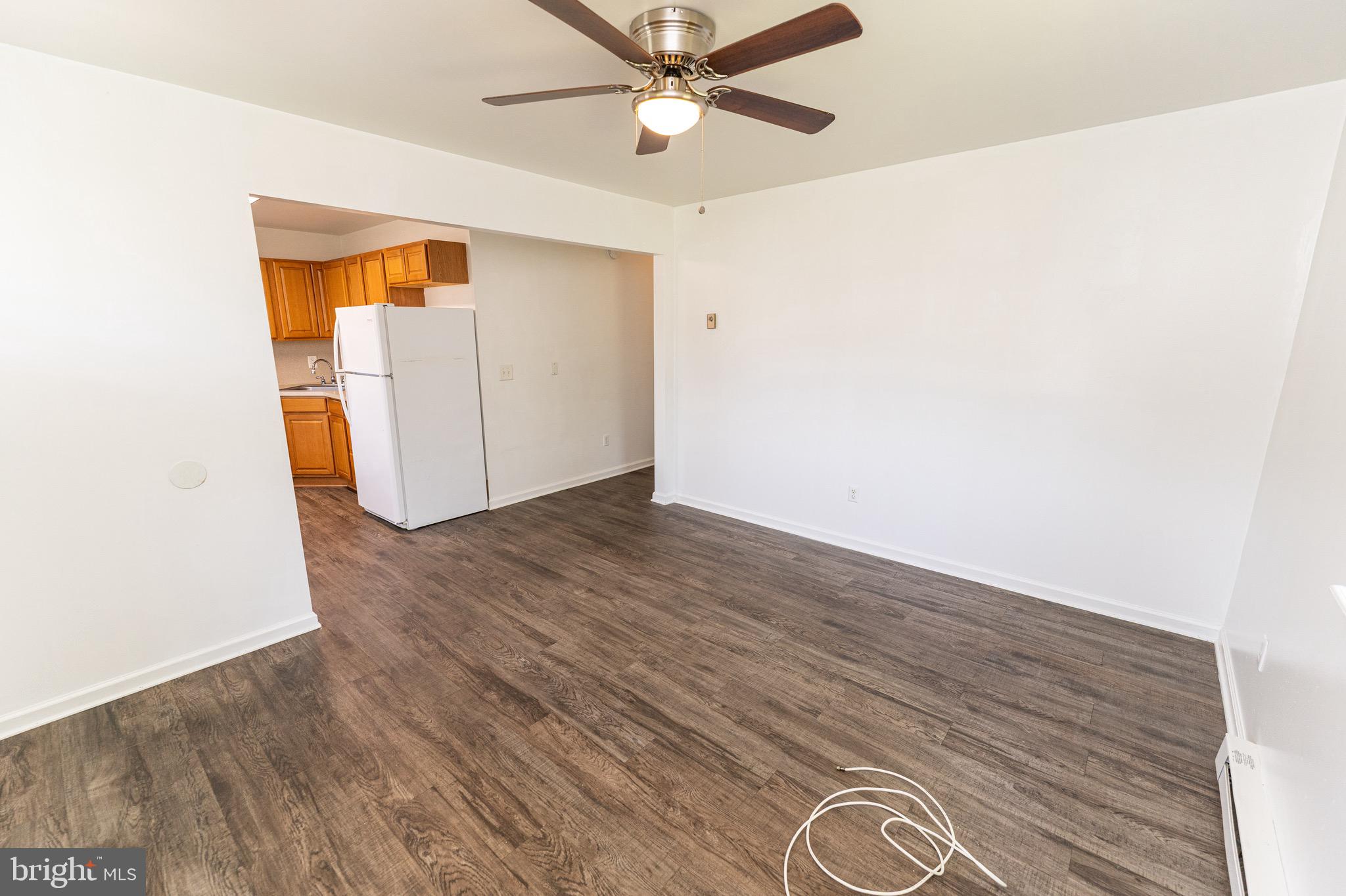 30704 Hampden Avenue Princess Anne, MD 21853 - Photo 10 of 31 a view of an empty room with wooden floor