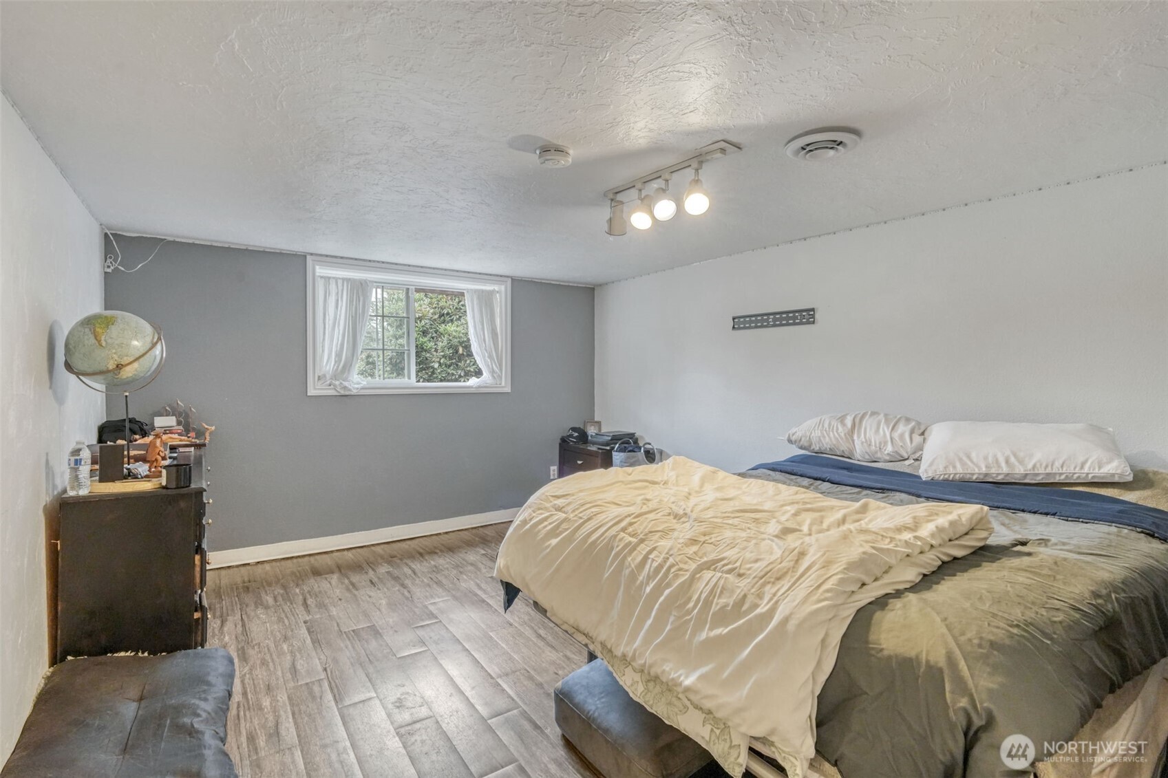 523 Haywire Road Winlock, WA 98596 - Photo 17 of 40 a bedroom with a bed and a window