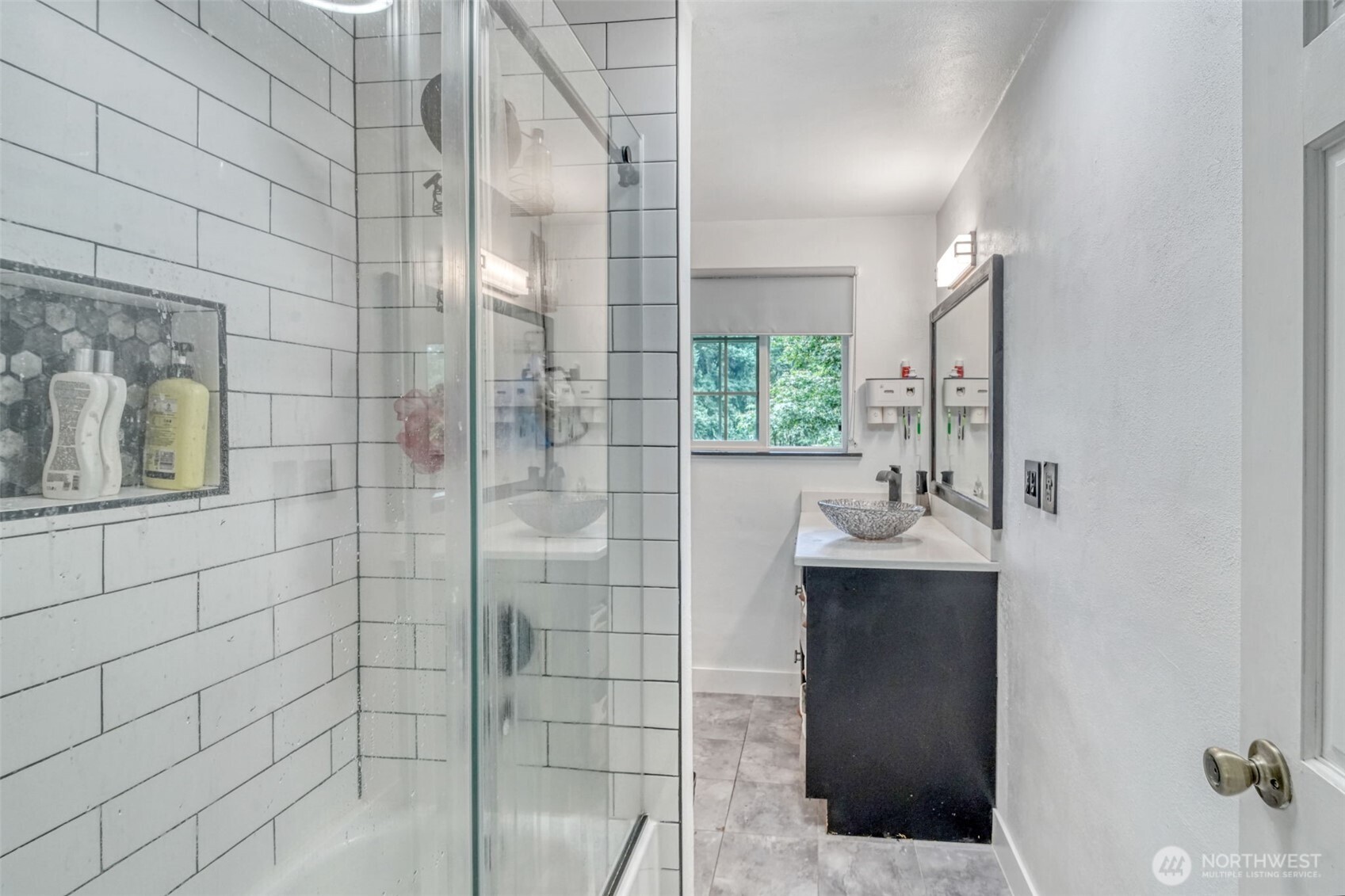 523 Haywire Road Winlock, WA 98596 - Photo 18 of 40 a bathroom with a sink shower and a mirror