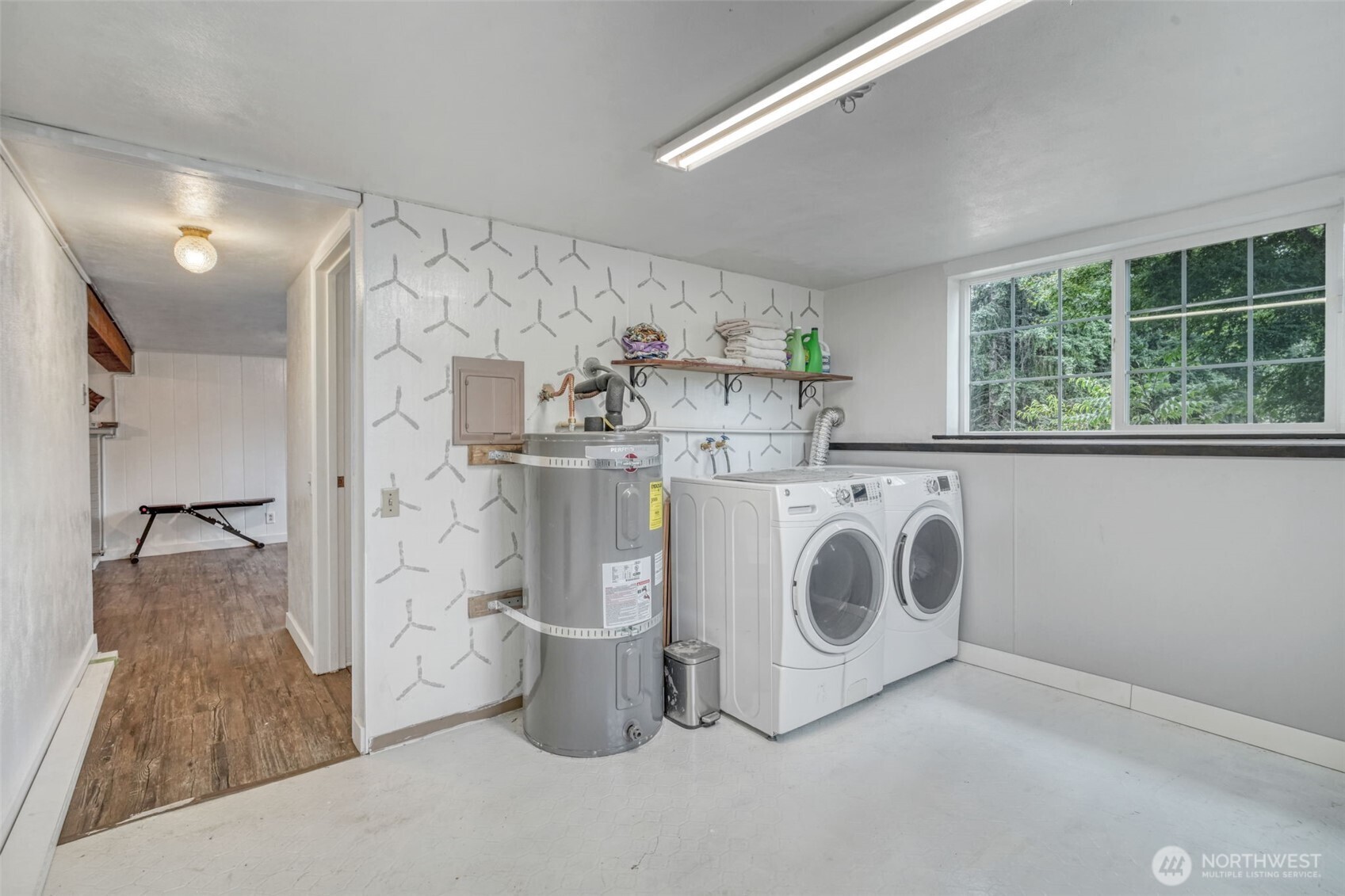 523 Haywire Road Winlock, WA 98596 - Photo 28 of 40 a utility room with stainless steel appliances washer and dryer