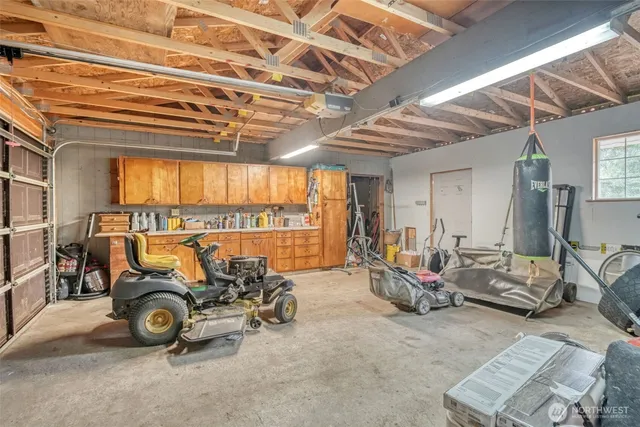 a view of a yard with chairs