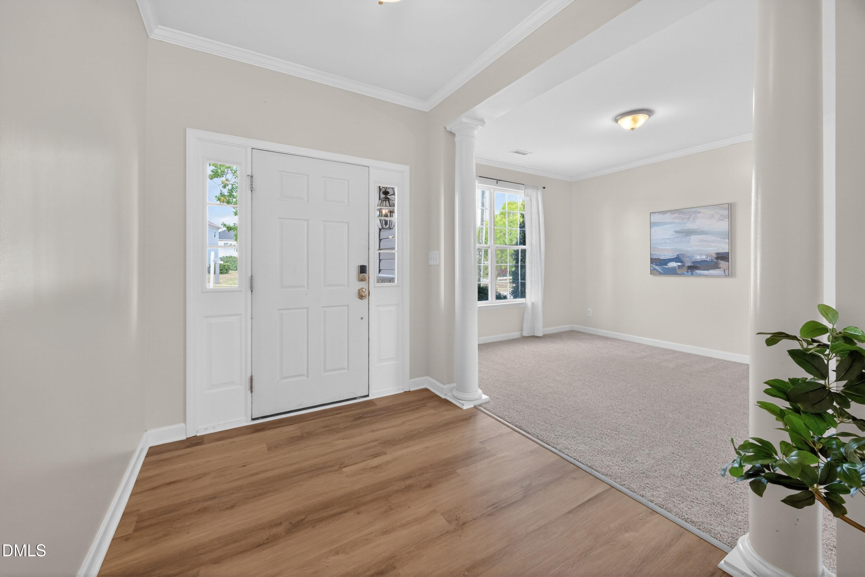 5304 Stone Station Drive Raleigh, NC 27616 - Photo 4 of 34 a view of livingroom with hardwood floor and window