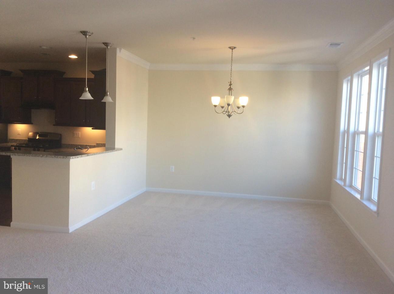 42571 Sunset Ridge Square, Unit 440 Ashburn, VA 20148 - Photo 8 of 11 Dining Room