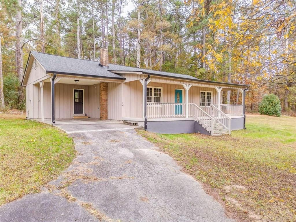 front view of a house with a yard