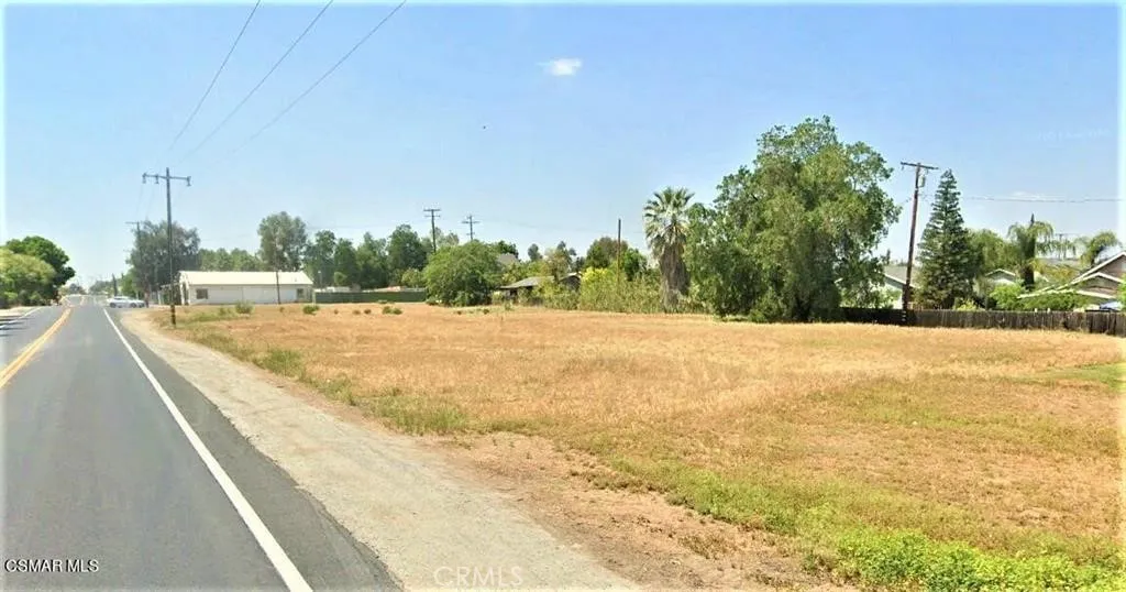 0 Narango Woodlake, CA 93286 - Photo 6 of 8 a view of a swimming pool with an outdoor space and seating area