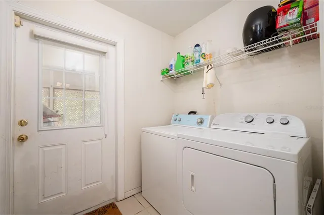 a utility room with dryer and washer