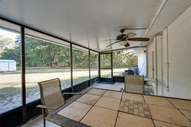 a living room with glass windows