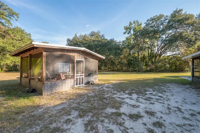 a view of a swimming pool with a patio