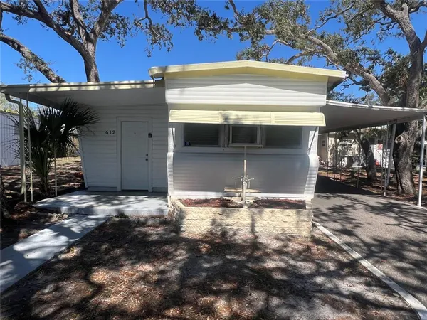 a view of a house with a garage