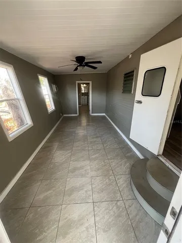 a view of a hallway with entryway