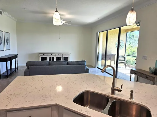 a view of a balcony with chairs