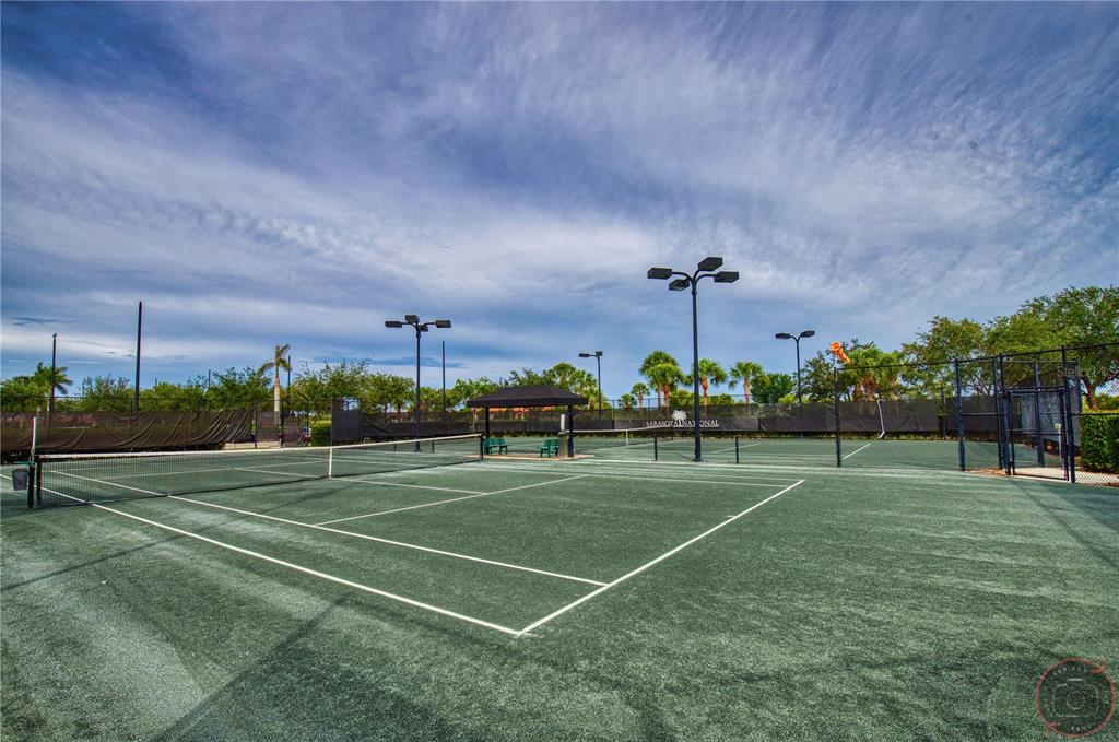 10039 Crooked Creek Drive, Unit 102 Venice, FL 34293 - Photo 5 of 36 a view of a basketball court