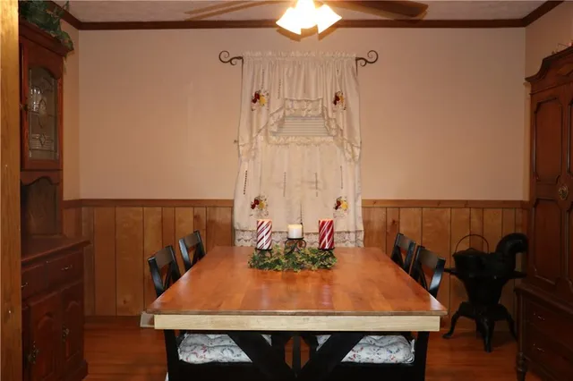 a view of a balcony with table and chairs