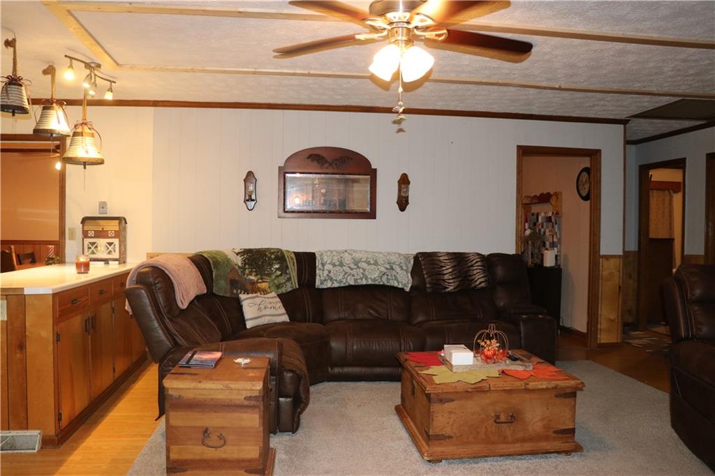 463 Compton Road Silver Creek, GA 30173 - Photo 3 of 12 a living room with furniture and a chandelier