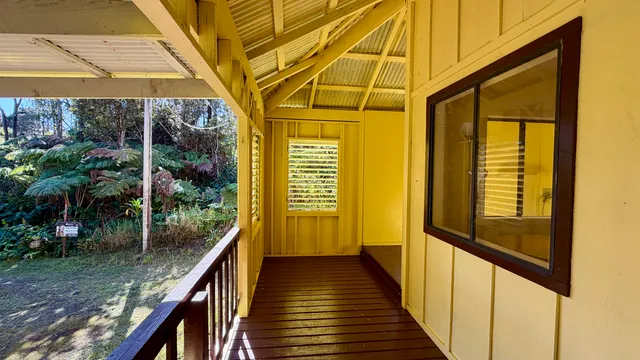 a view of balcony with wooden floor and outdoor space