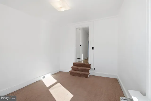 a view of entryway with stairs