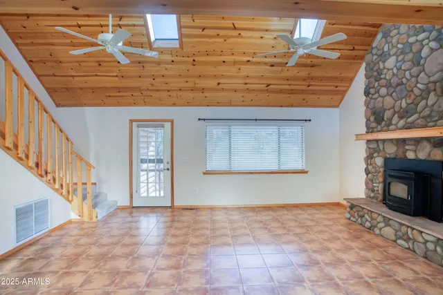 a view of an entryway with fireplace