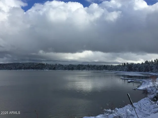 a view of a lake with a mountain in the background