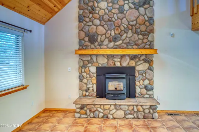 a view of an entryway with a fireplace