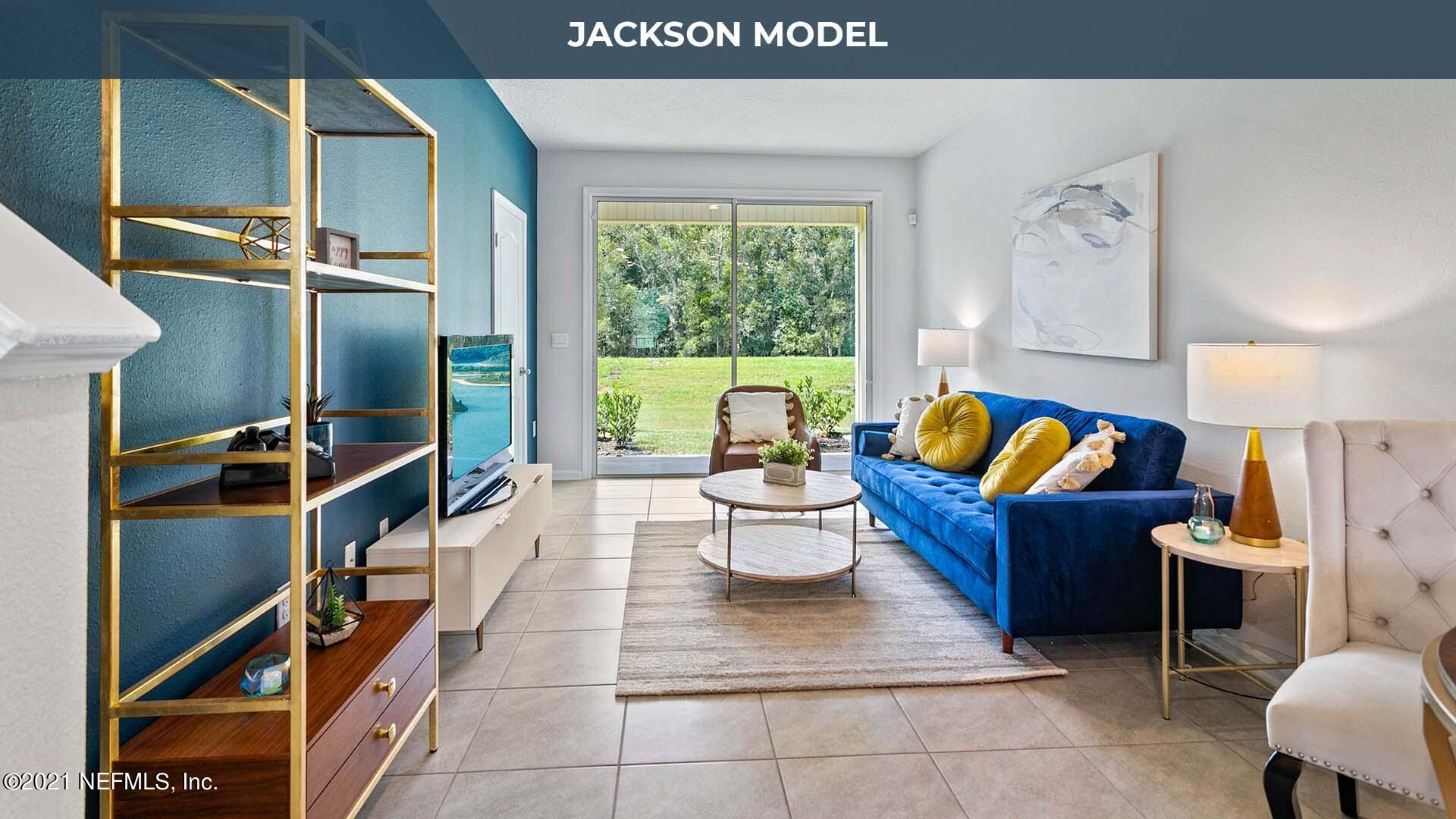 805 Gate Run Road Jacksonville, FL 32211 - Photo 3 of 25 a living room with furniture gym equipment and a large window