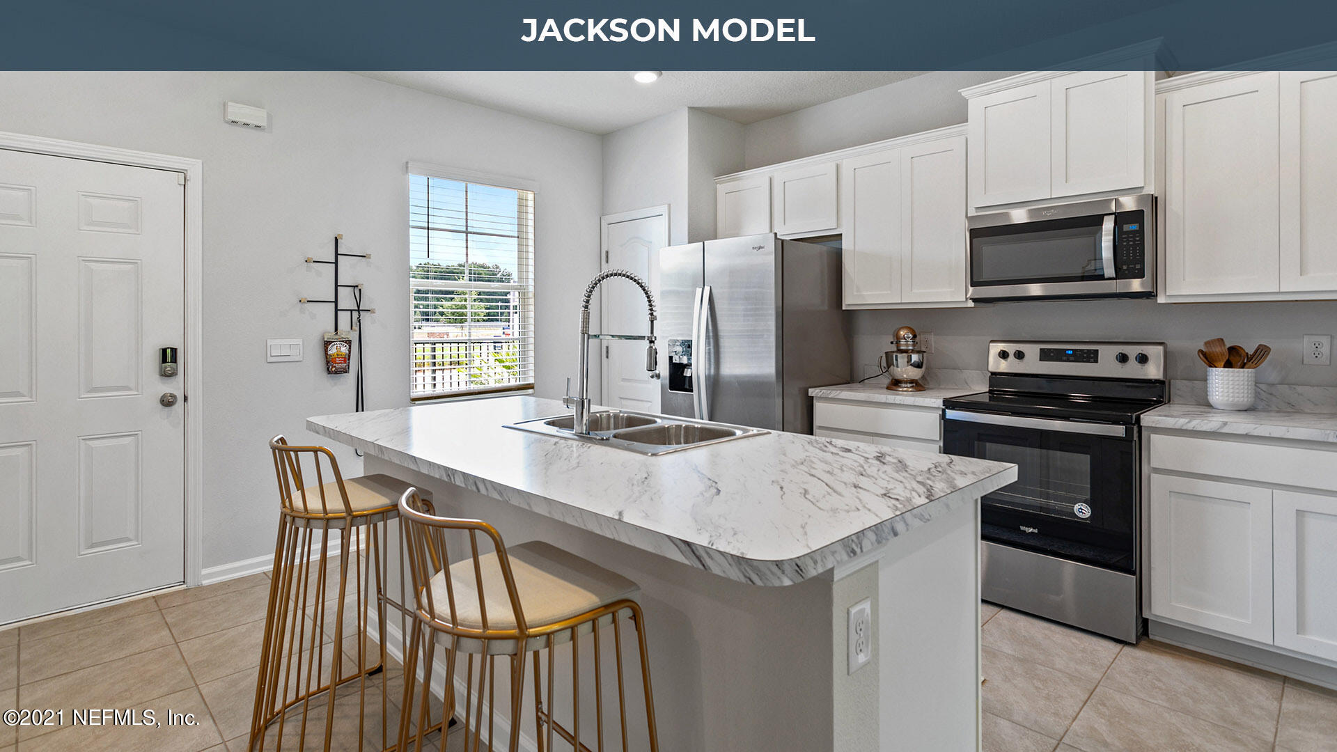 805 Gate Run Road Jacksonville, FL 32211 - Photo 4 of 25 a kitchen with stainless steel appliances a stove a sink a microwave and a refrigerator