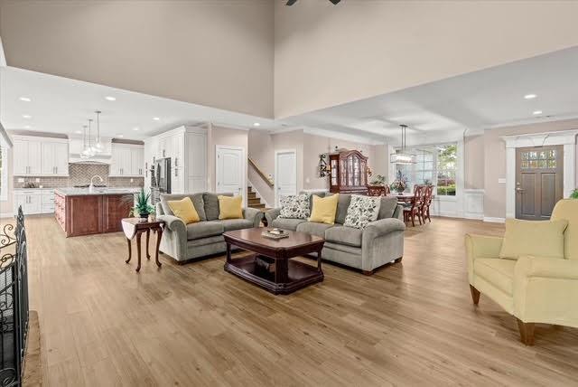 5320 North Helton Road Winston, GA 30187 - Photo 13 of 54 a living room with furniture and a dining table with kitchen view