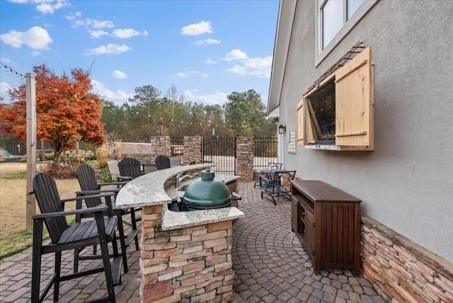 5320 North Helton Road Winston, GA 30187 - Photo 18 of 54 a outdoor dining space with furniture